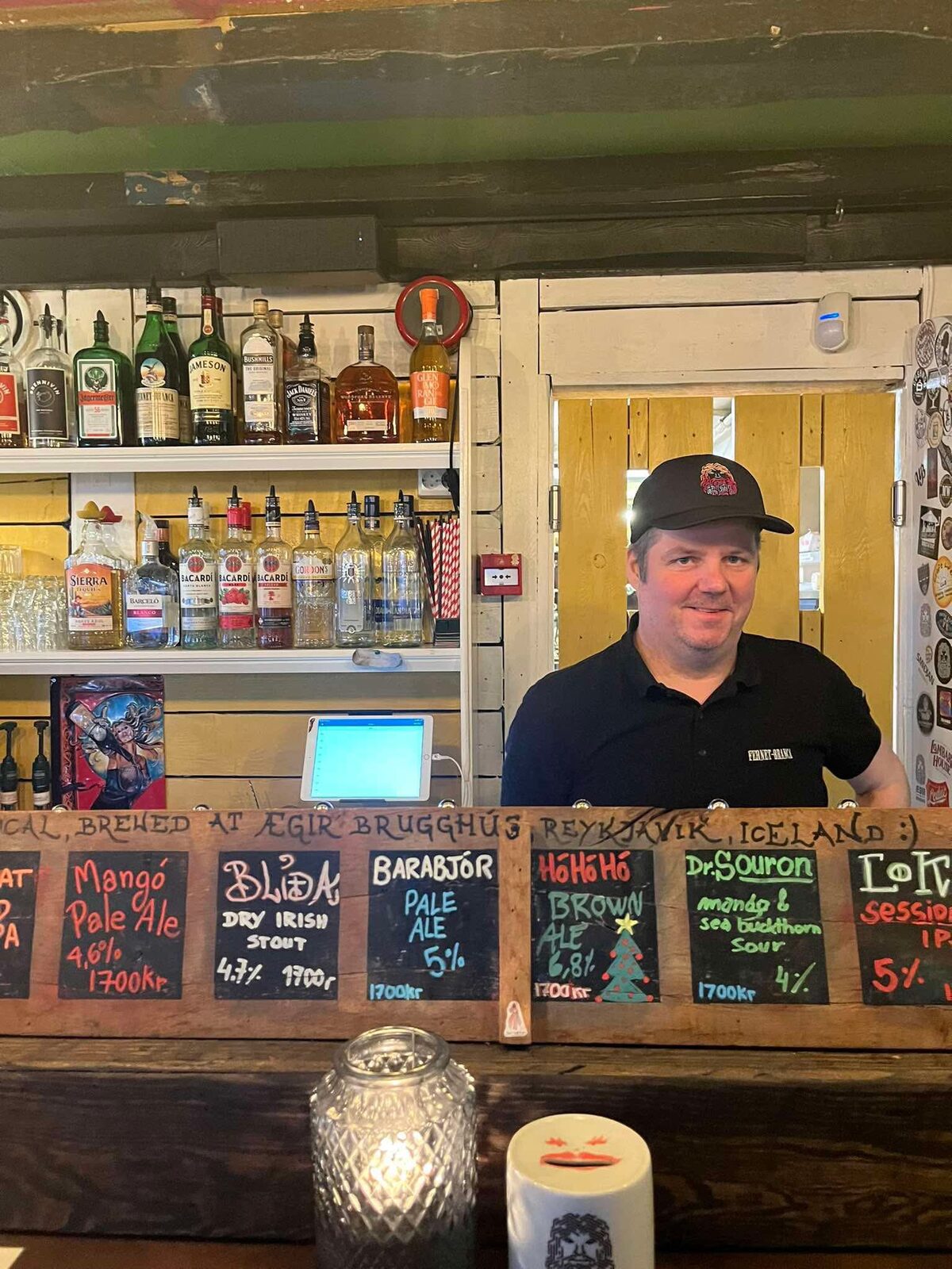 Bartender behind the bar at ÆGIR 101